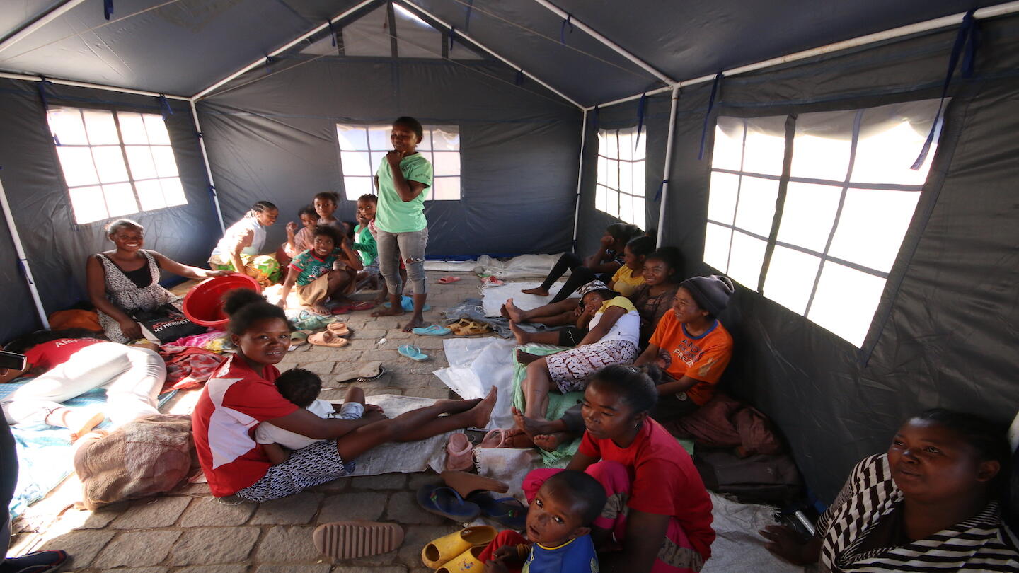 Women at temporary shelter sites after Cyclone Gamane 